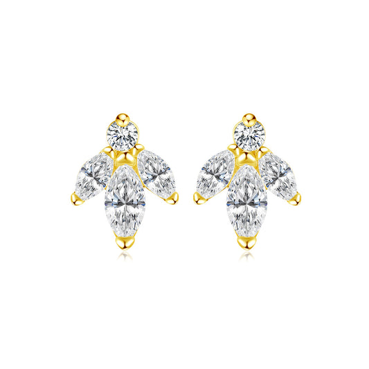 Yellow Gold and clear crystal earrings on a white background
