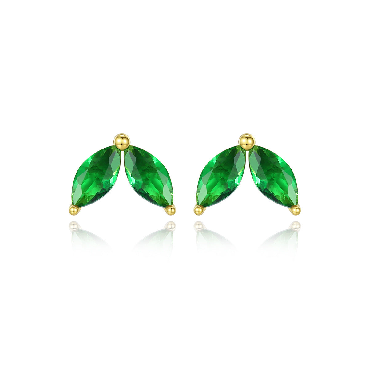 Pair of green cubic zirconia earrings with gold settings on a white background
