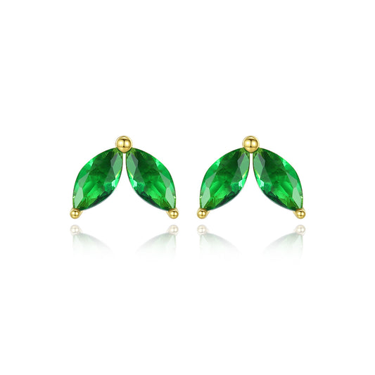 Pair of green cubic zirconia earrings with gold settings on a white background