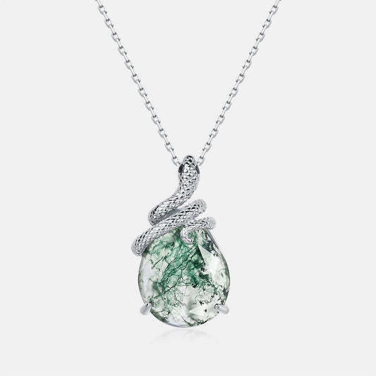 Silver necklace: Teardrop moss agate pendant entwined with textured silver snake, isolated on white, ideal for fashion accessory promotion