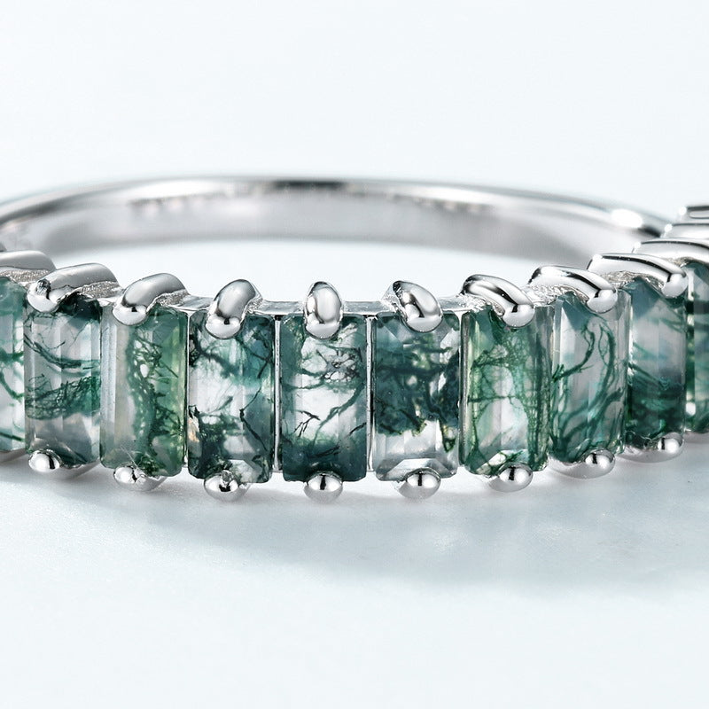 Silver ring with moss agate: An extreme close - up of rectangular stones, showcasing the intricate internal patterns within the moss agate.