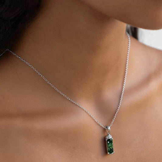 Silver necklace with moss agate pendant, worn on a neck, cubic zirconia details, elegant for daily wear