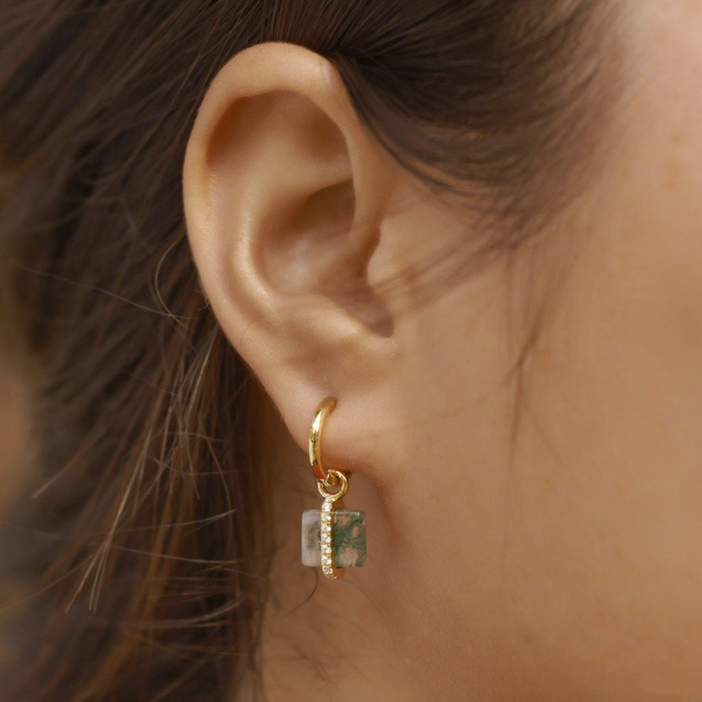Gold hoop earrings with square moss agate dangles, diamond - lined bar, worn on a ear, chic for daily match